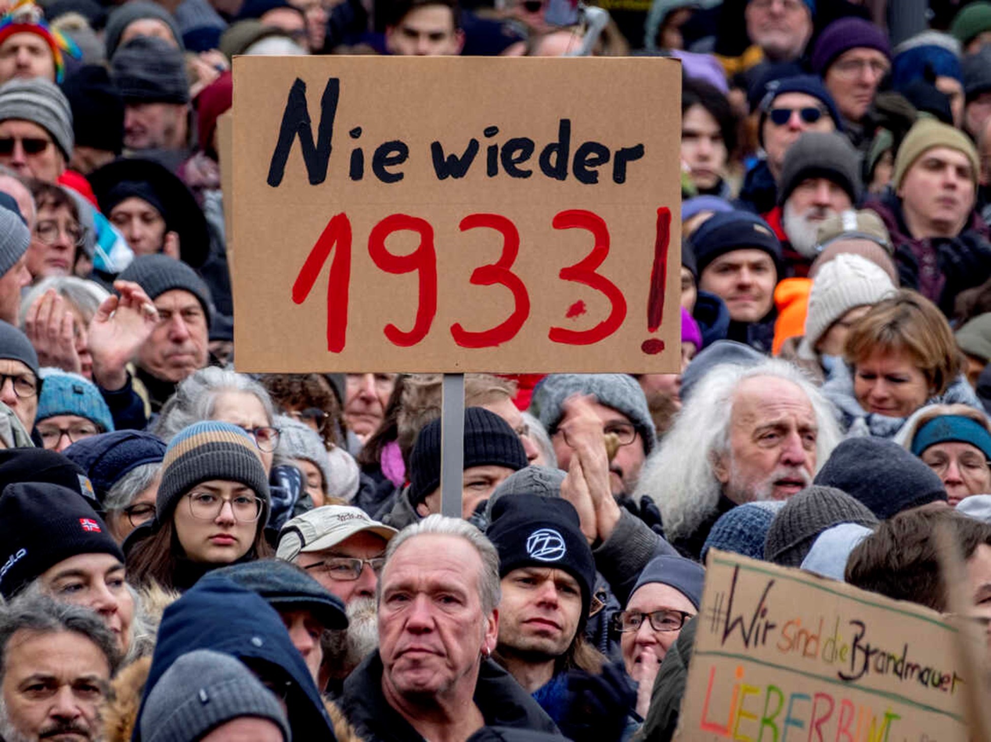 Protest in Germany with sign reading